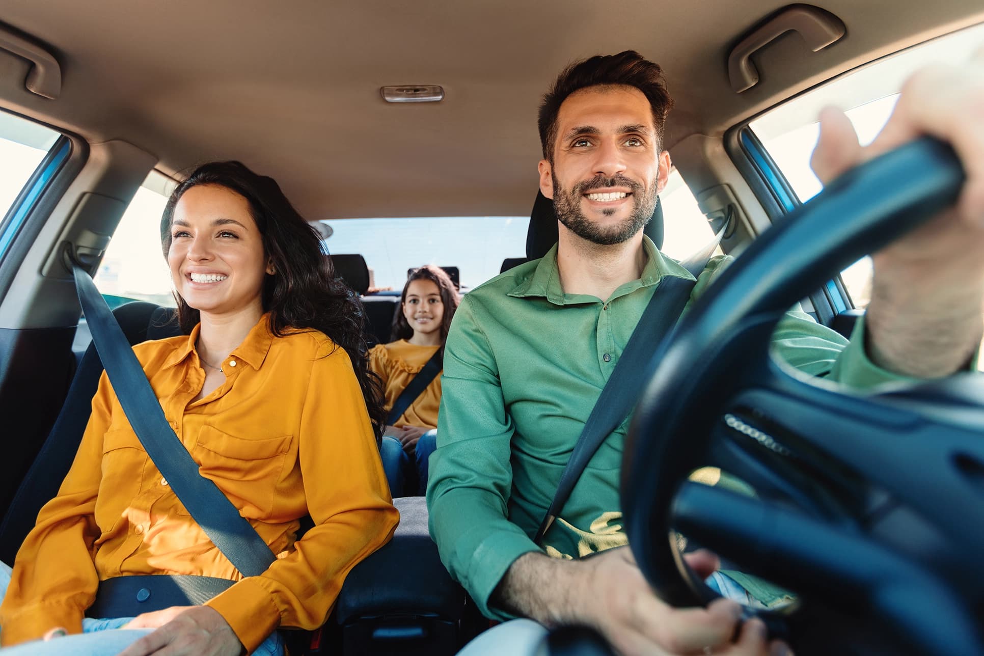 Family driving together with the protection of Amtex Auto Insurance in Texas.
