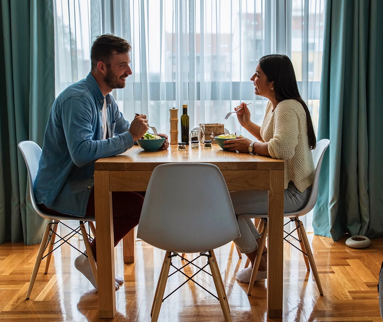 Couple enjoying their apartment, representing renters insurance protection for tenants from Amtex Insurance.